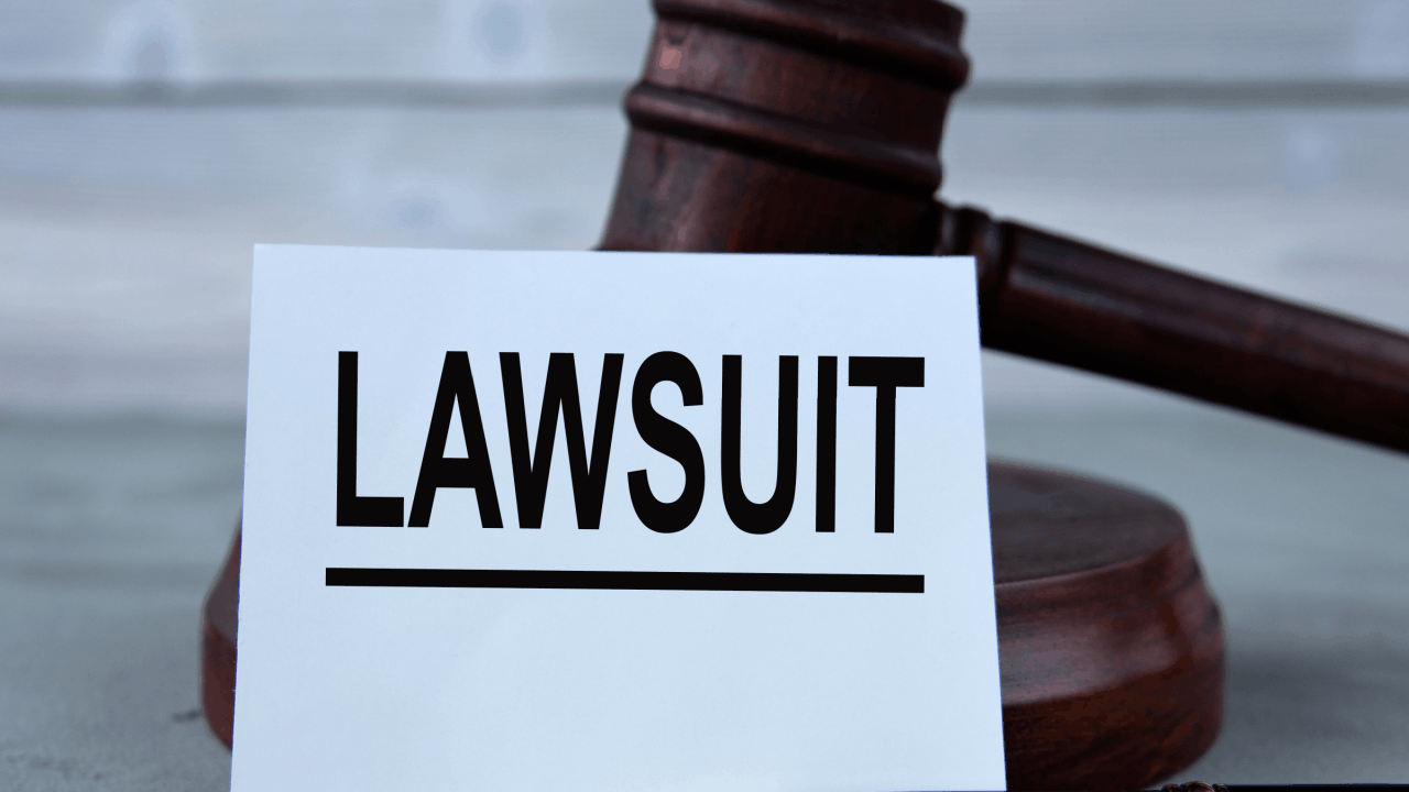 Employment lawsuit sign with a judge's gravel