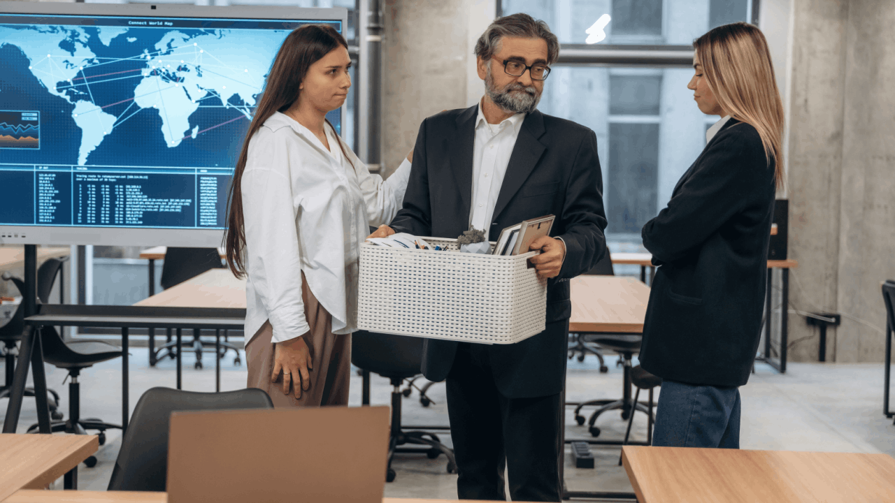 Wrongful termination compensation discussion in a modern office